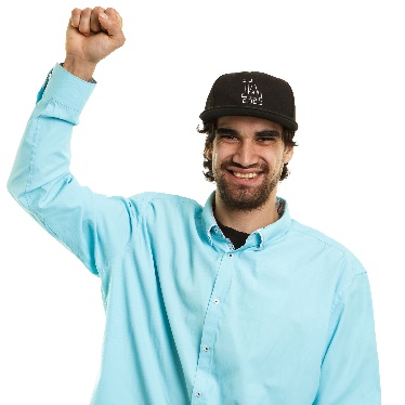A person smiling, with their fist raised. 