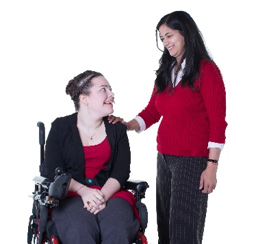 A person in a wheelchair, and someone else has their hand on their shoulder. 