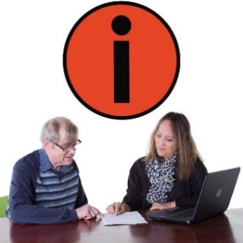 Two people looking over a document with an information symbol above them. 