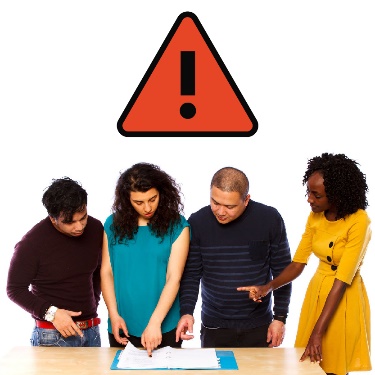 A group of people looking over a document with an importance icon above. 