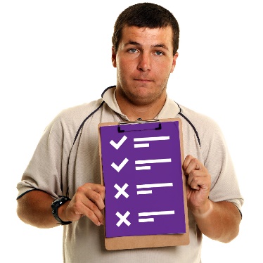 A person holding a list of rules, with ticks and crosses. 