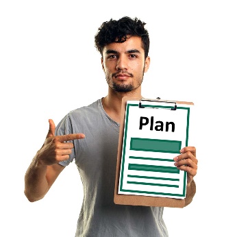 A man holding a plan. 