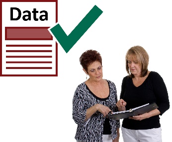 Two women reading a document and a data icon with a tick. 