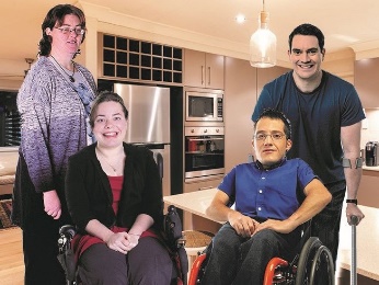A group of people with disability in a kitchen. 